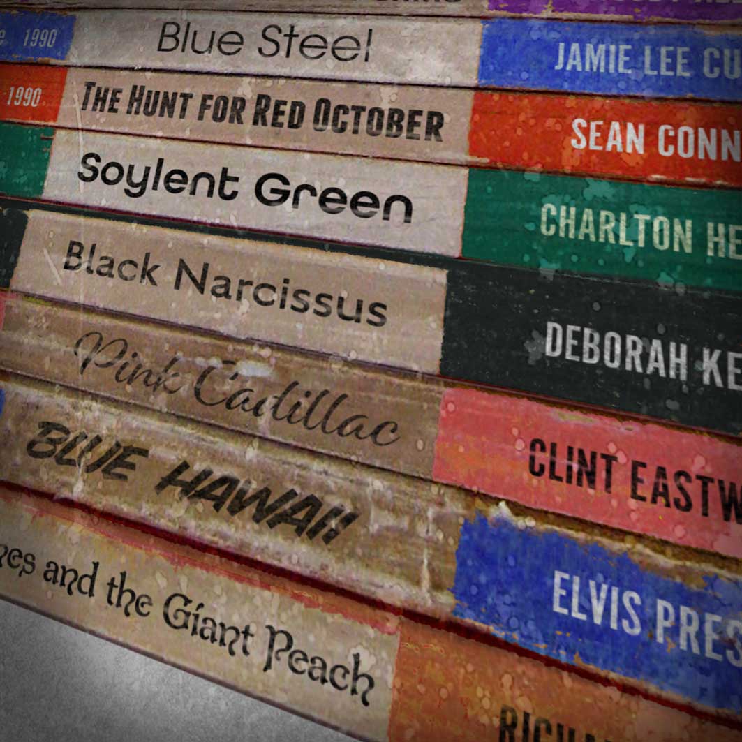 Stack of book spines as films by colour titles