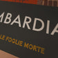  Lombardia Cycling Poster print - The Monuments. The great Autumnal classic. Lombardia remains one of the great challenges for the climbers. The poster design reflects a leaf taken from the race's nickname 'The race of the falling leaves'. Also featured is a quote from Lombardia winner Dan Martin. One of a series of 5 which includes Milano-Sanremo, Tour of Flanders, Paris-Roubaix and Liege-Bastogne-Liege.
